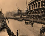 King Edward VII's coronation procession along Whitehall in front of the construction site of the War Office (1902)